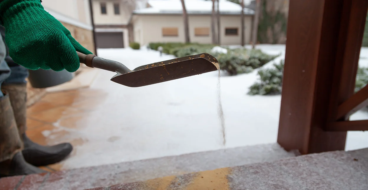 GUY technician salting and sanding.