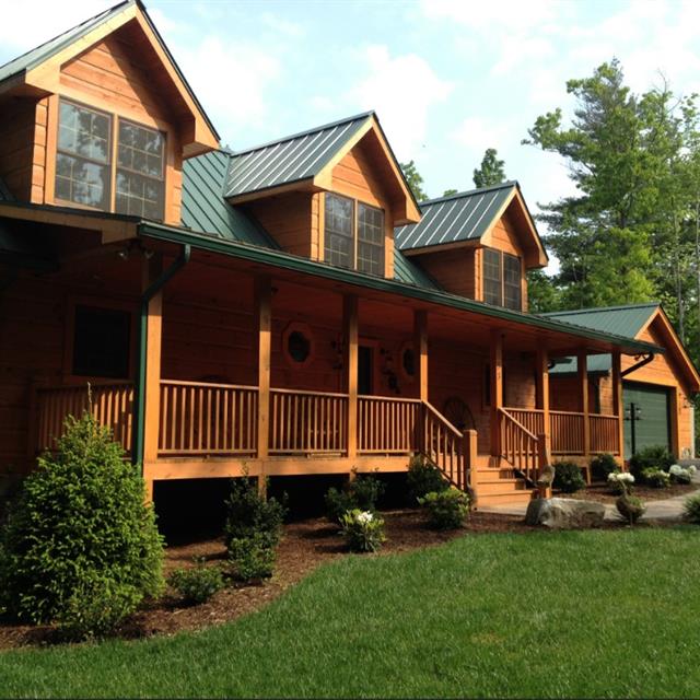 A beautiful home with lawns in the front