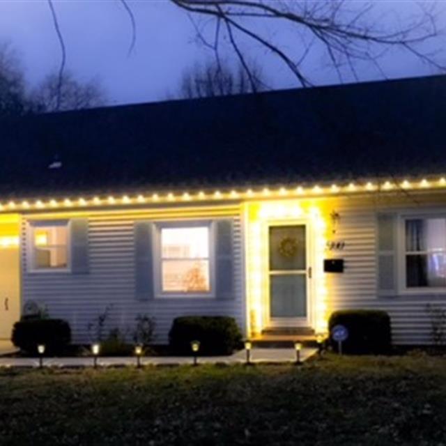 A house decorated for Christmas.