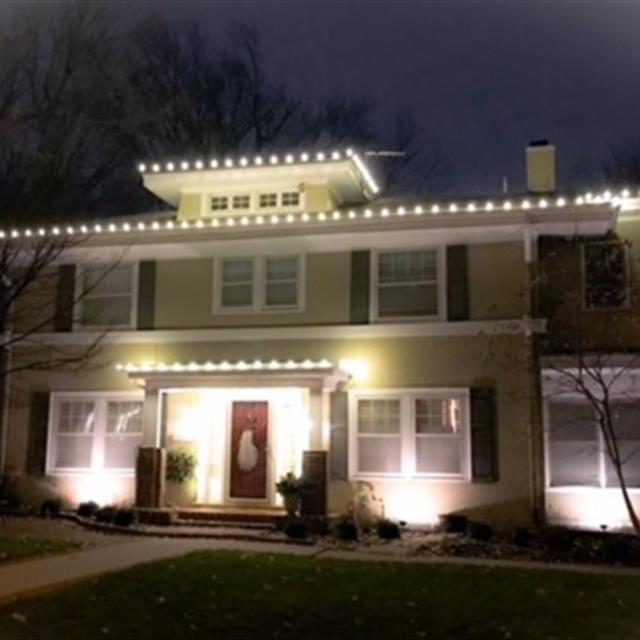 A house with lights outside.