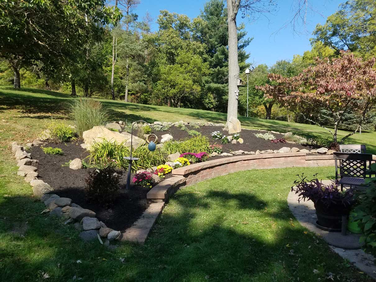 Planters with stone work and trees