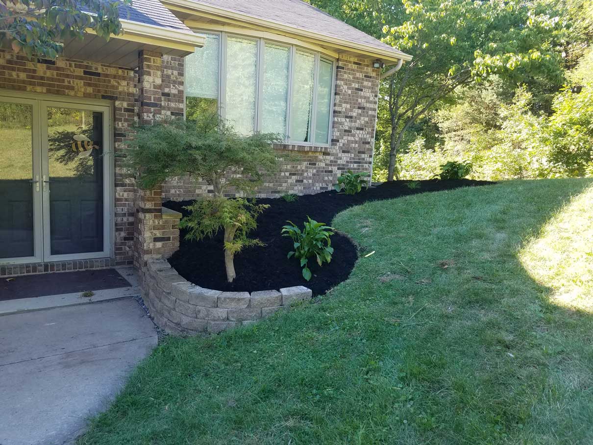 Stone retaining wall and fresh planter