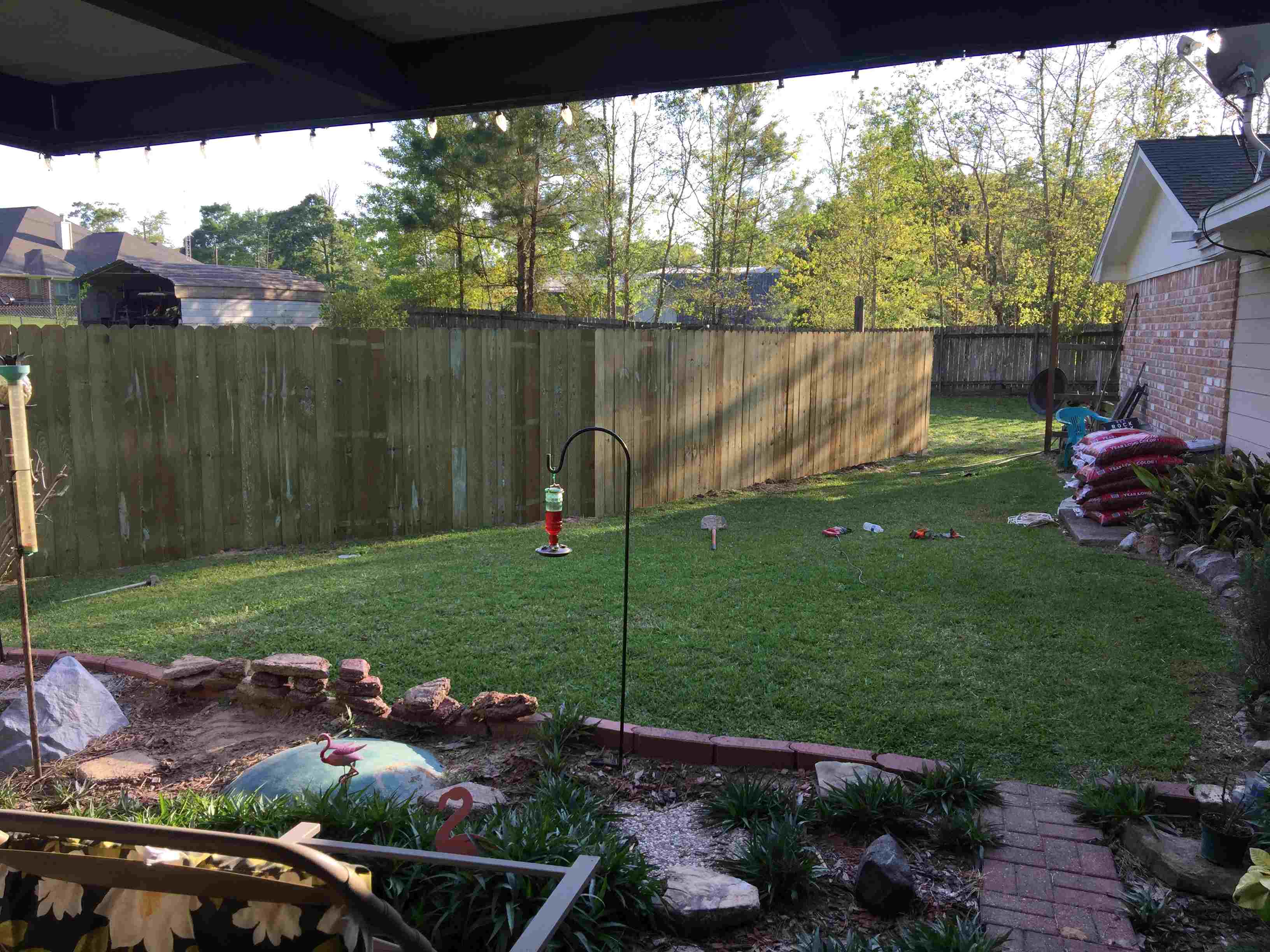 Backyard with wooden fence 