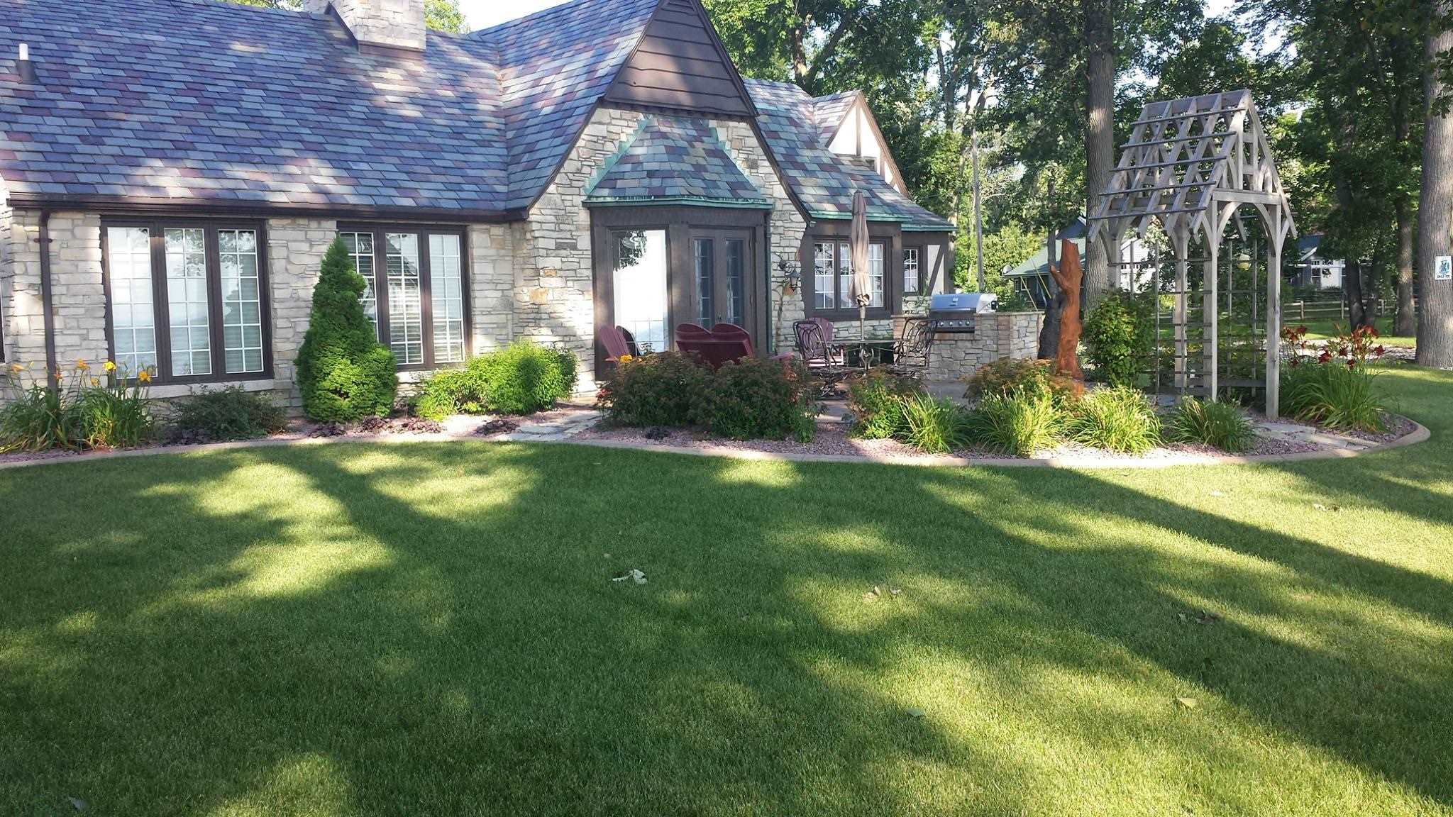 Well manicured lawn and planters