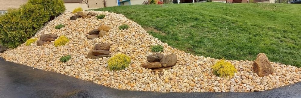 Gravel bed with assorted rocks and plants in South Hills Pittsburgh