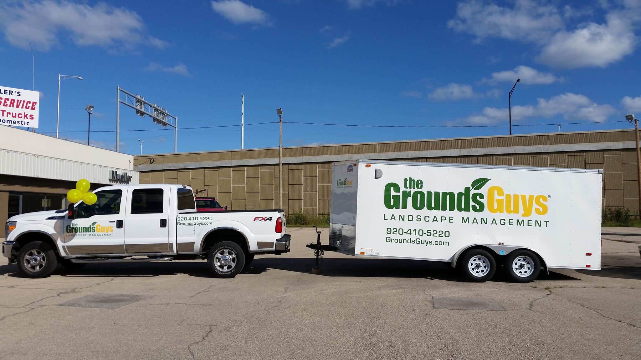 Grounds Guys truck and trailer