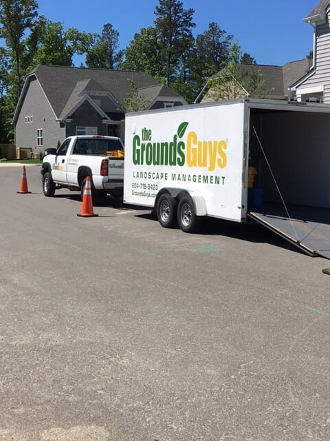 Grounds Guys truck and trailer