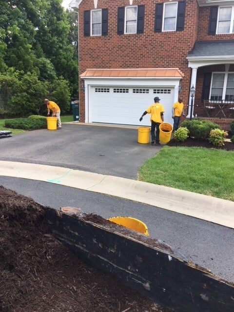 Grounds Guys working 