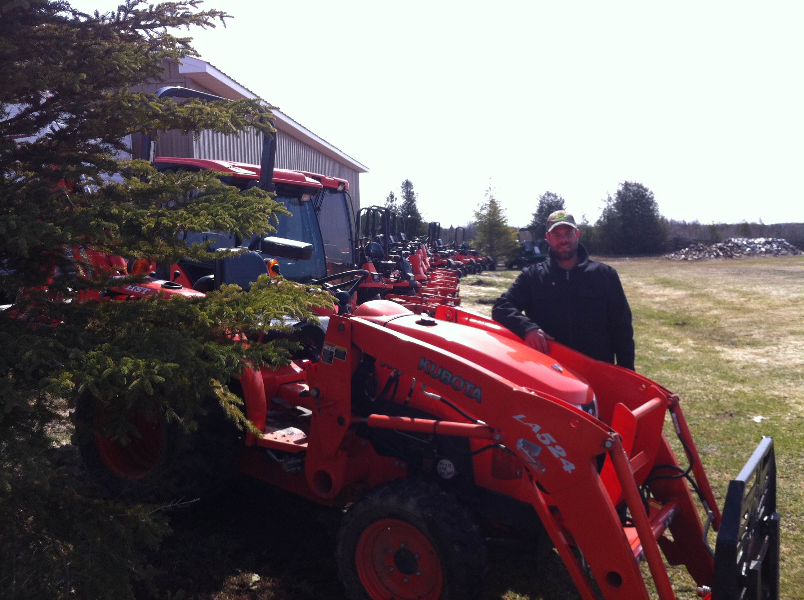 Man standing next to heavy equipment