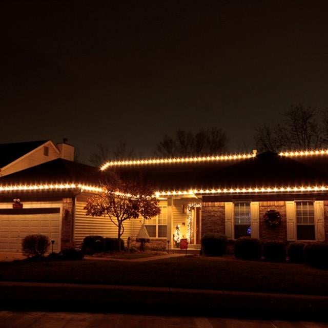 Outdoor lights in a house at night.