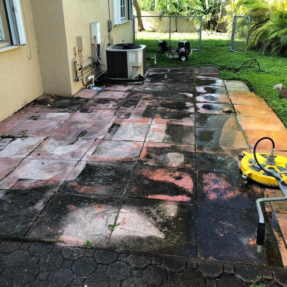 Pressure Washing a dirty driveway