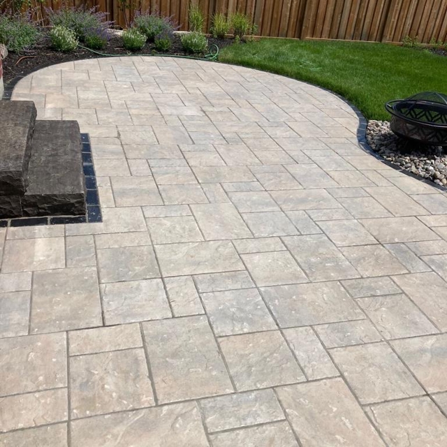 Stone paved patio and garden bed