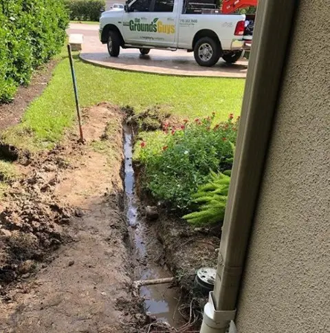 drainage ditch being installed