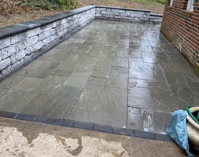 Installation of wall and pavers using natural stone in Mt. Lebanon