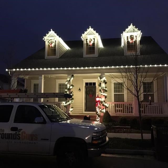 house Christmas lighting done by ground guys.