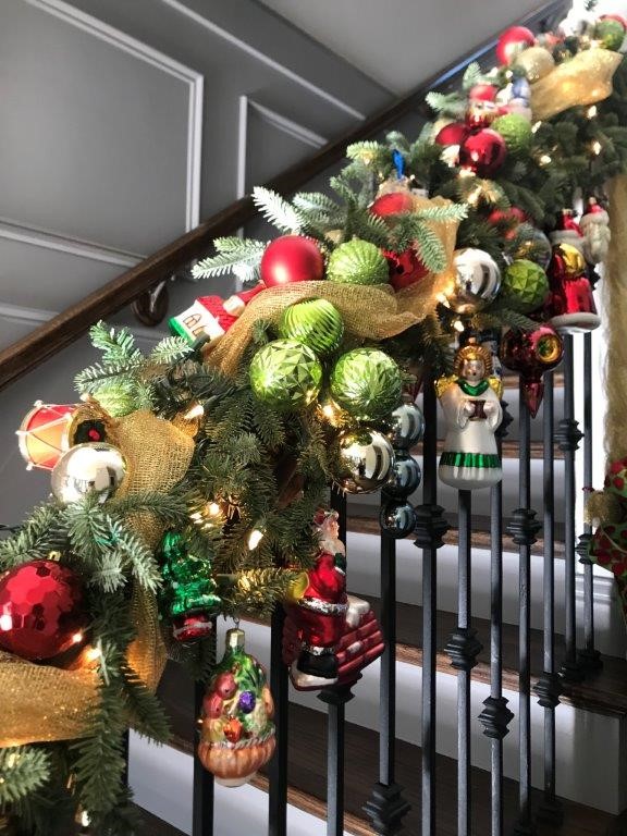 stair banister with ornaments and lights