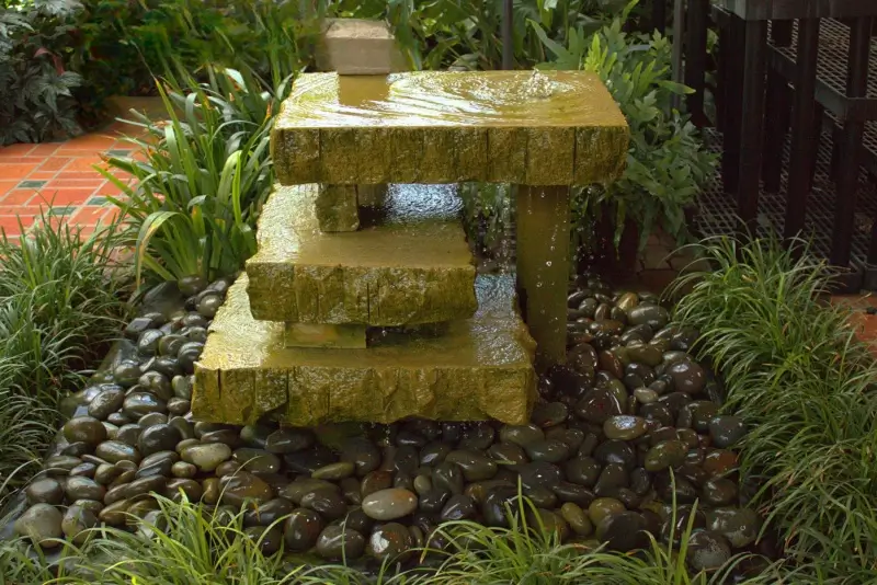 Water feature with river rocks. 