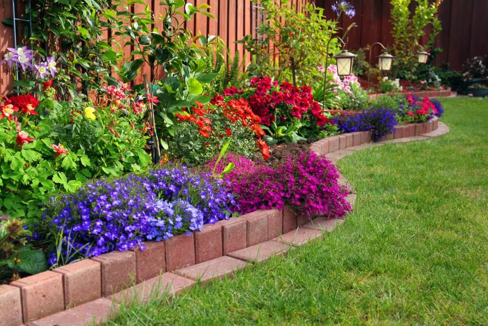 Flower bed with brick edging